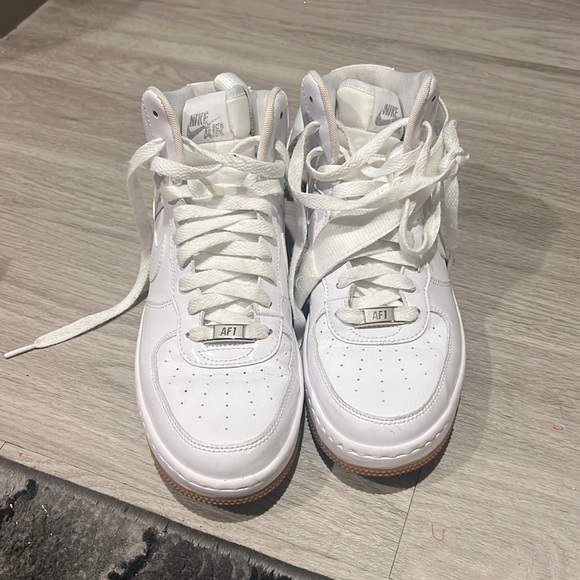 Nike Air Force high top. Shiny and normal material. Never worn